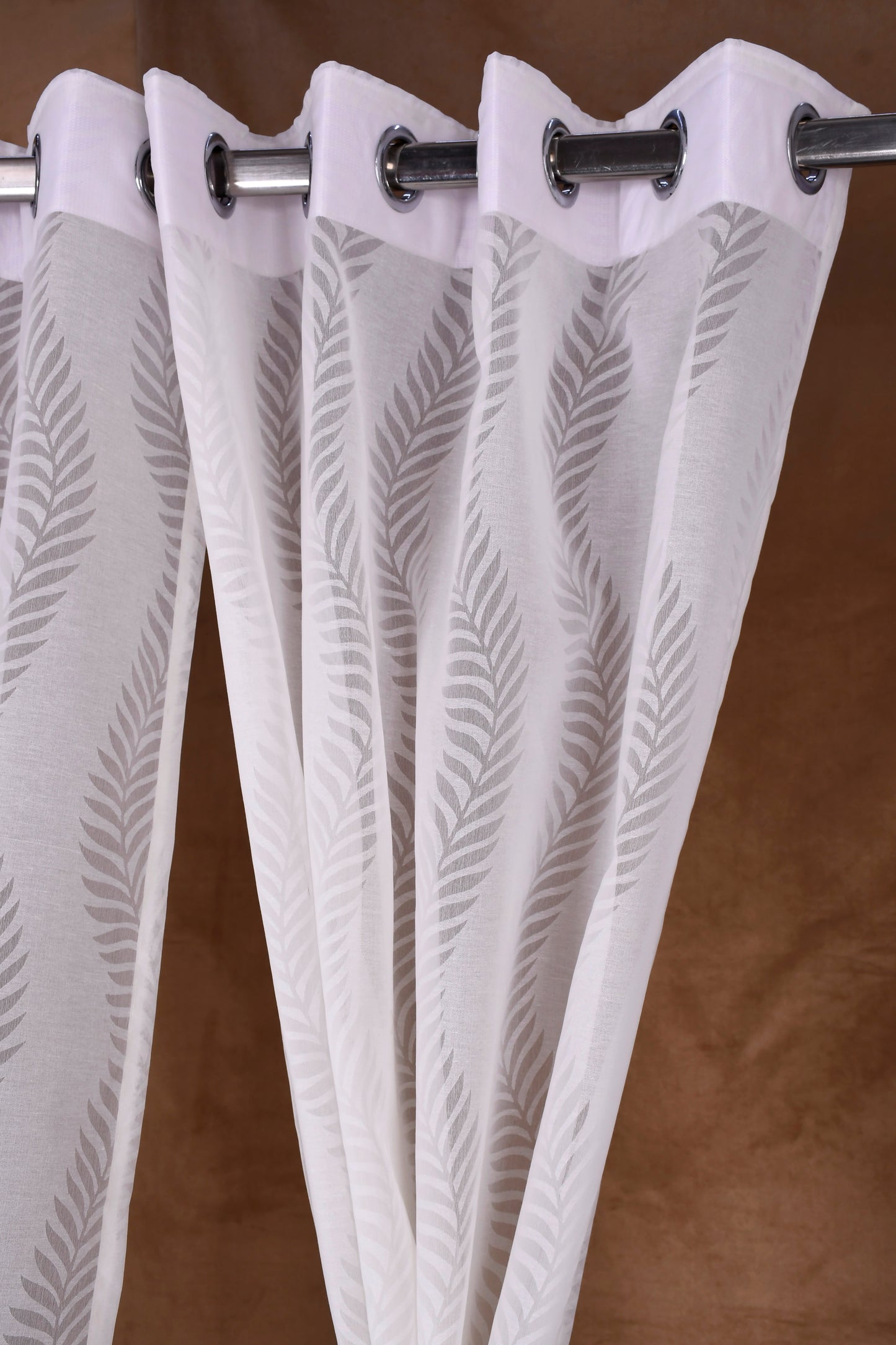Mero Collection Curtains with Eyelet patttern in Sheer fabric with self textures in Pearl White Colour Stripe Leaf Brasso