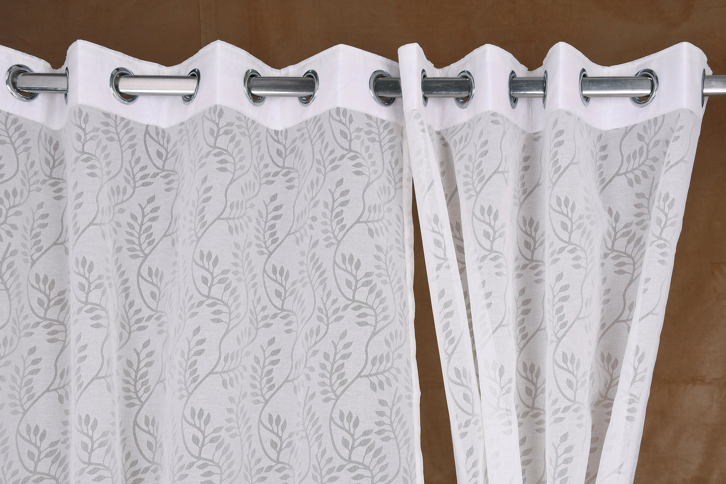 Mero Collection Curtains with Eyelet patttern in Sheer fabric with self textures in Pearl White Colour Swirl Brasso
