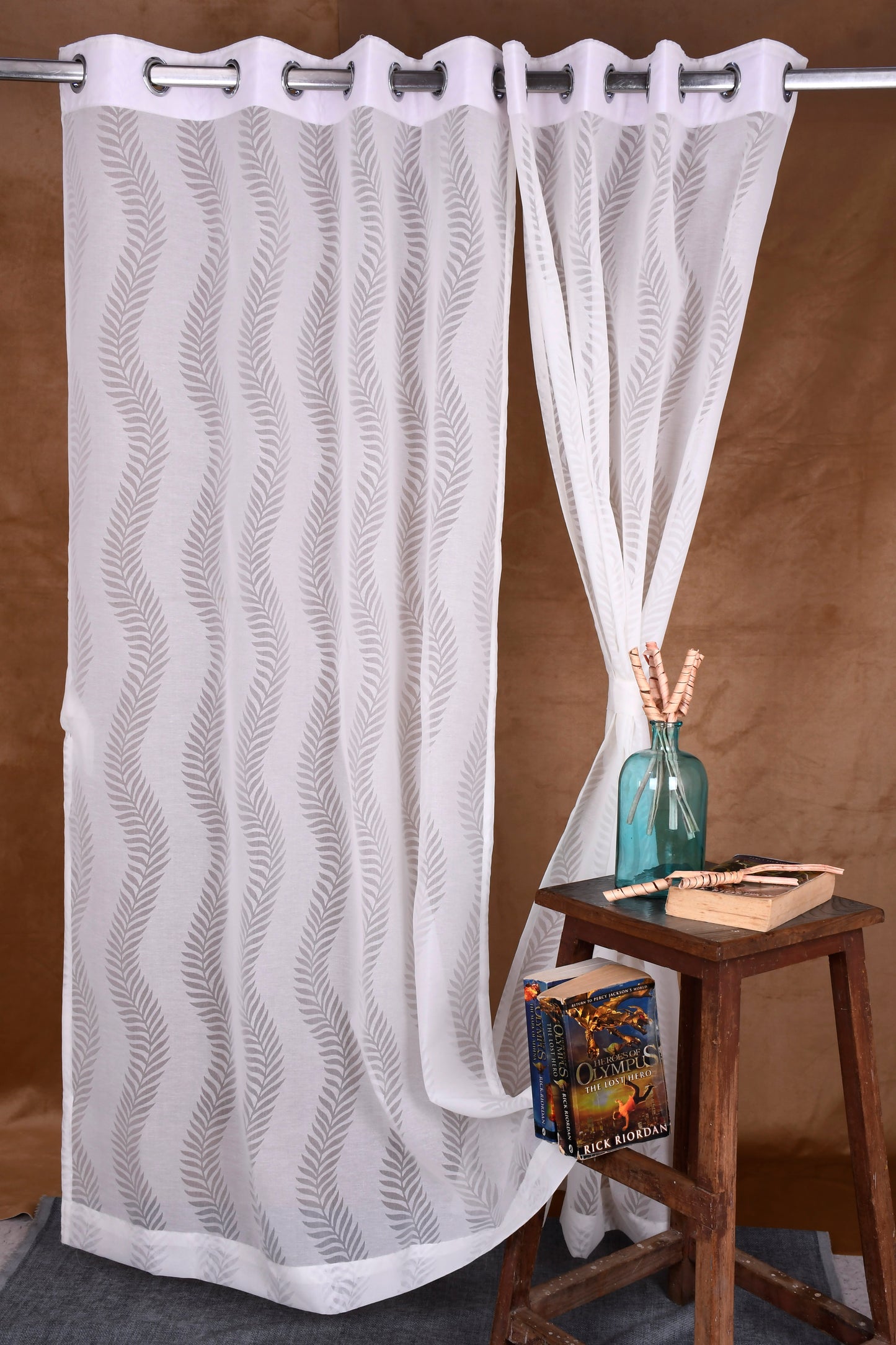 Mero Collection Curtains with Eyelet patttern in Sheer fabric with self textures in Pearl White Colour Stripe Leaf Brasso