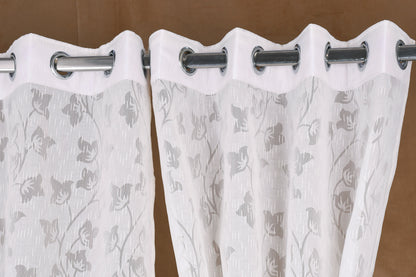 Mero Collection Curtains with Eyelet patttern in Sheer fabric with self textures in Pearl White Colour Motif Leaf Brasso