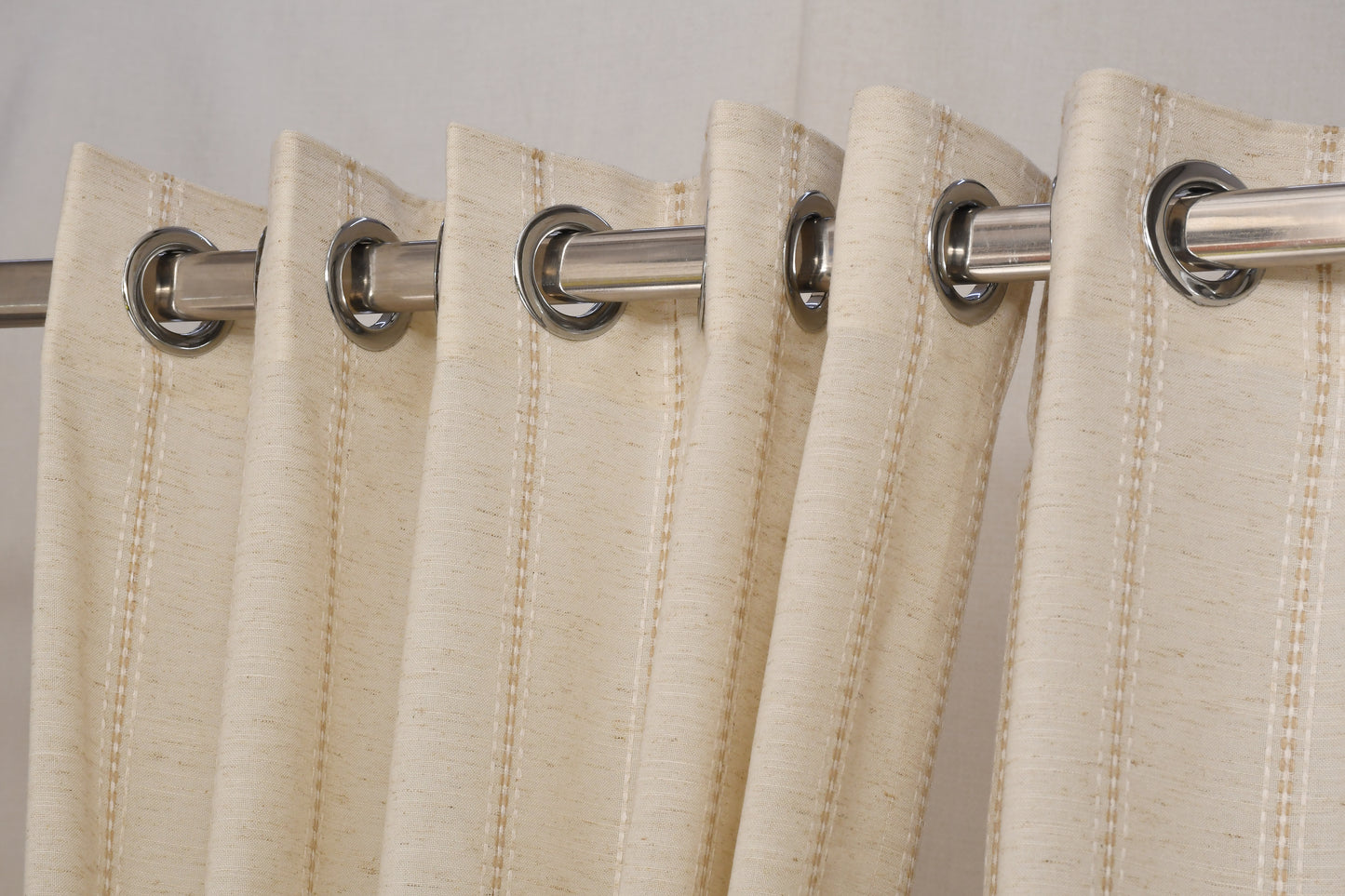 Ricamo Collection Curtains in Eyelet patttern with Stripe Embroidered Work Design in Natural Linen Colour.