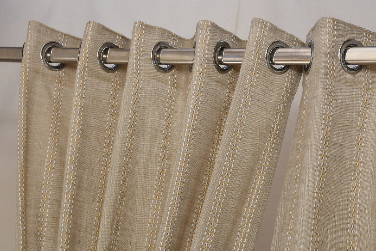 Ricamo Collection Curtains in Eyelet patttern with Stripe Embroidered Work Design in Buff Colour.